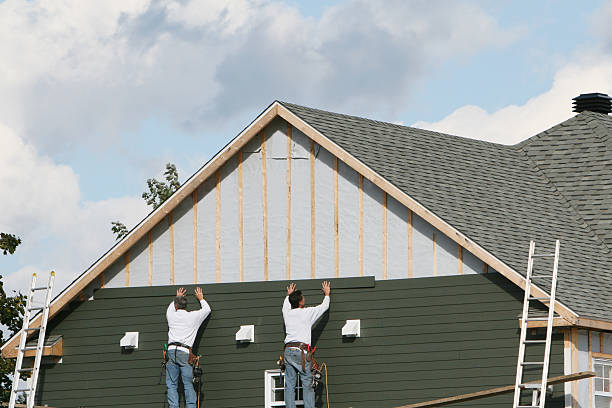 Professional Siding Repair technician working in Fayville, MA